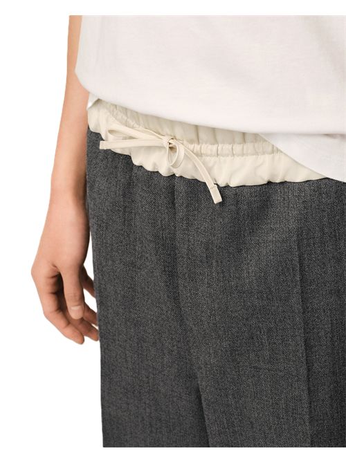 Pantaloni elasticizzati in gabardine di lana e satin. Ami Paris | HTR917.WV0216A189 CARBON